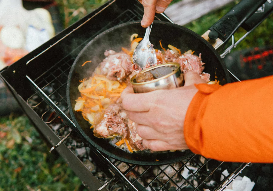 preparing diner on campsite